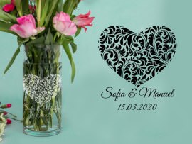 Florero de cristal redondo con grabado